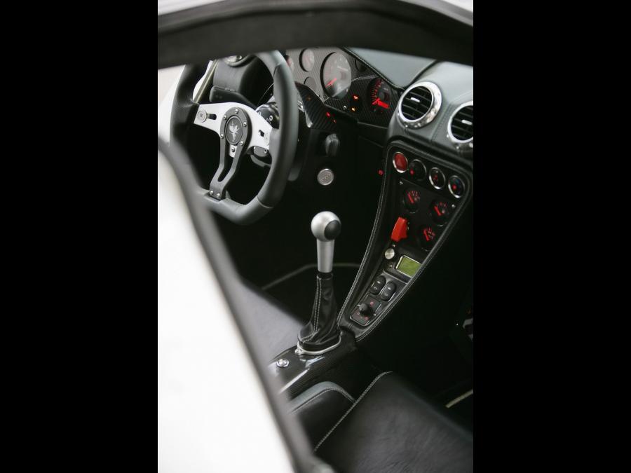 Интерьер Gumpert Apollo Sport 2009 года  (фото 5 из 15)